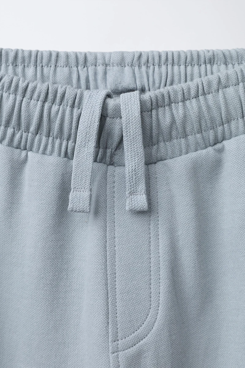 INTERLOCK PIQUÉ POLO AND PANTS SET