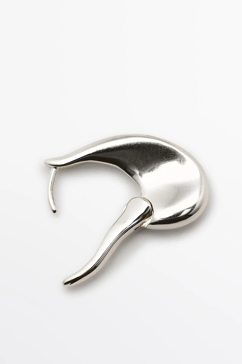 Boucles d’oreilles créoles lignes fluides