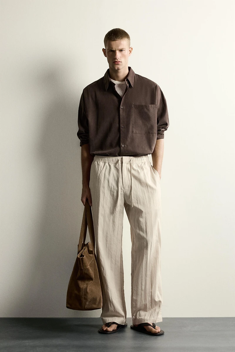 CRINKLED EFFECT TECHNICAL RELAXED FIT PANTS