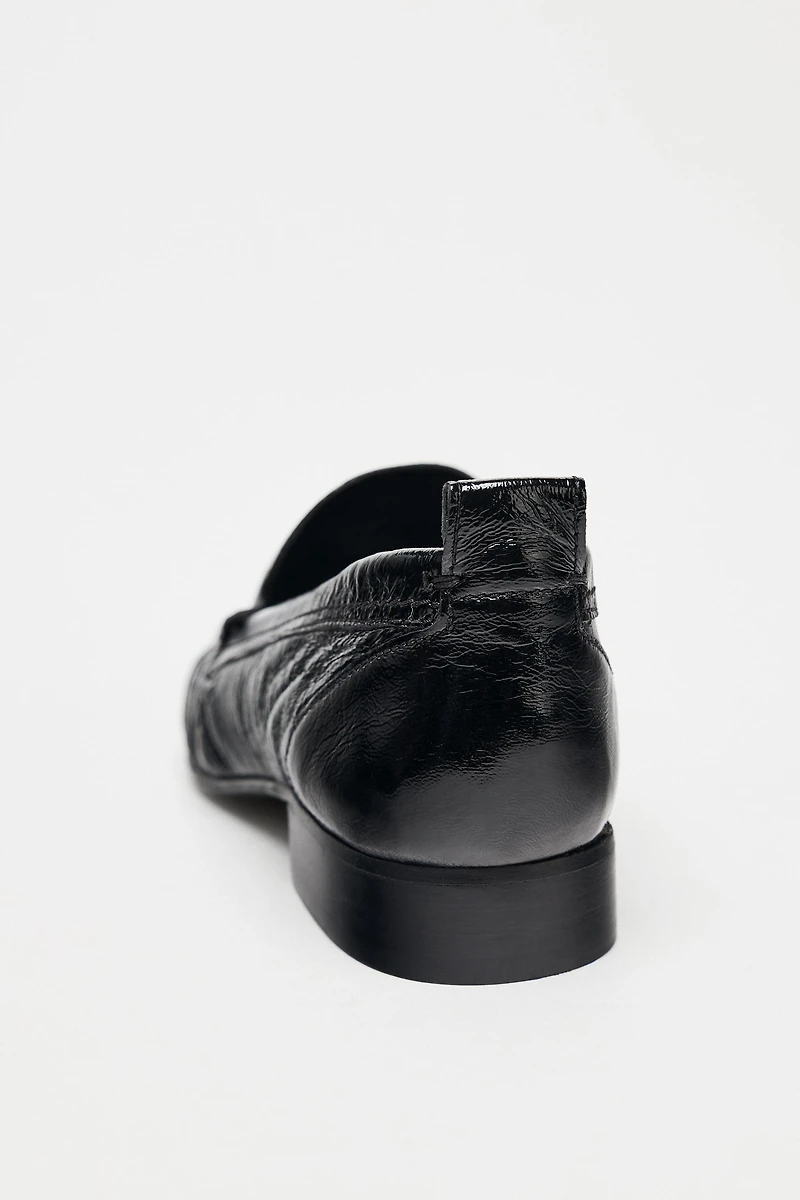 GATHERED TASSEL LEATHER LOAFERS