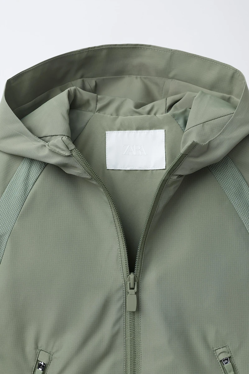 INTERLOCK WATER REPELLENT RAINCOAT