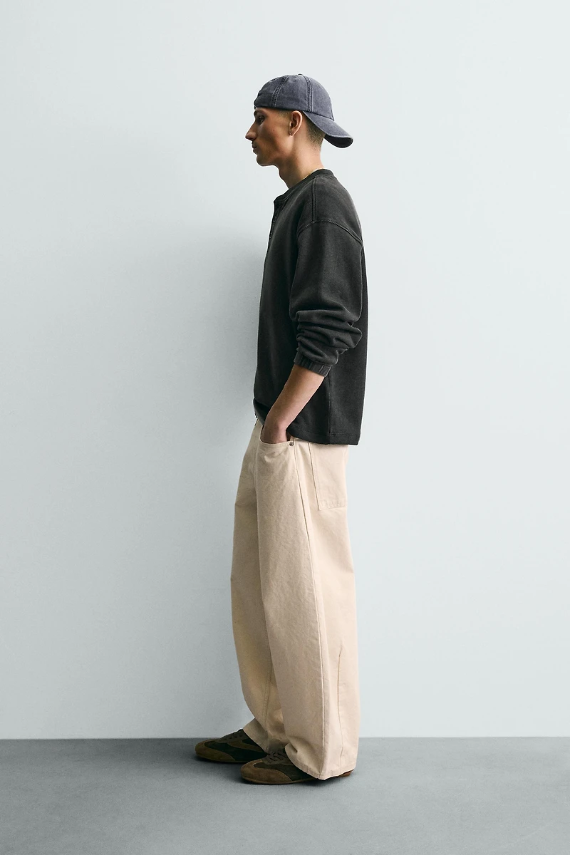 STRUCTURED HENLEY SWEATSHIRT