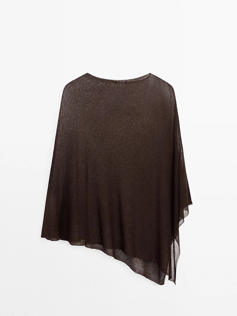 Cape en maille coupe asymétrique