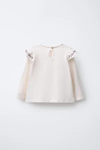 EMBROIDERED FLORAL RUFFLE SHIRT