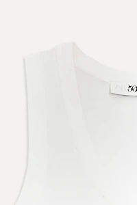 SLEEVELESS KNIT TOP 50TH ANNIVERSARY