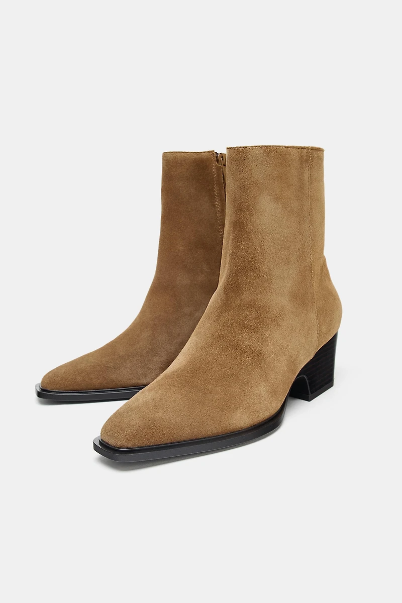 BOTTINES À TALONS EN CROÛTE DE CUIR