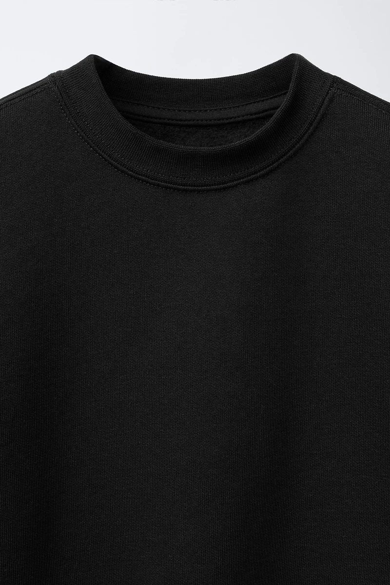 SWEAT BASIQUE À INSCRIPTION