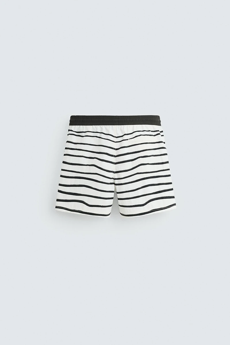 OTIS KWAME KYE QUAICOE PRINTED MID-LENGTH SWIMSUIT