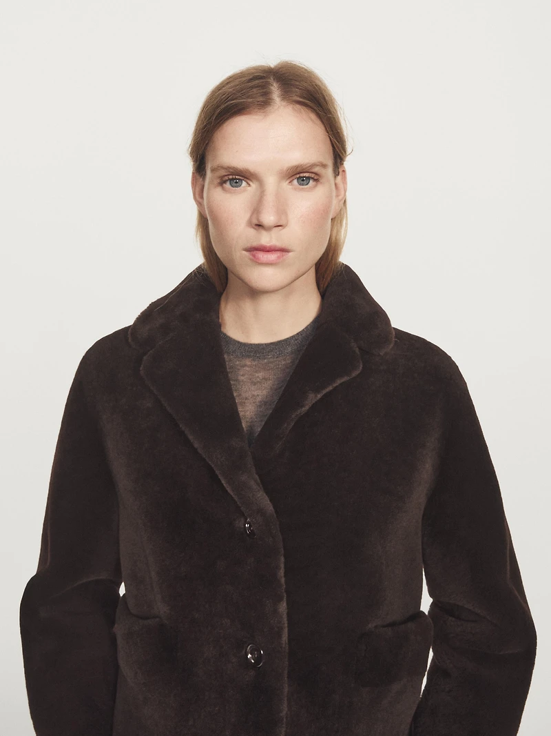 Veste moutonnée courte en peau