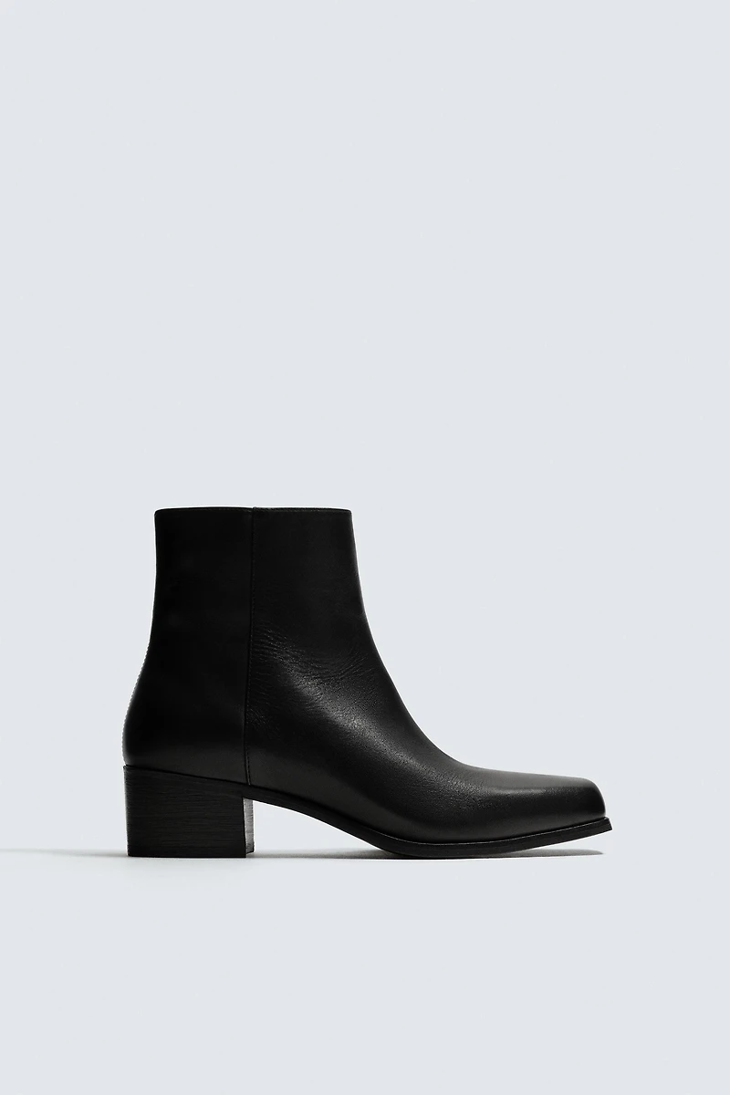 HEELED LEATHER BOOTS