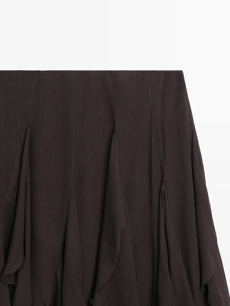 Asymmetric skirt with ruffles
