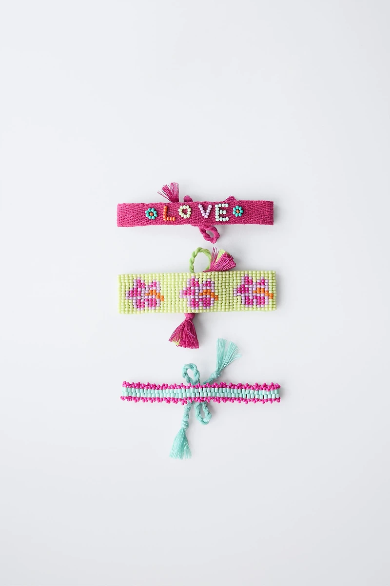 LOT DE TROIS BRACELETS DE FANTAISIE