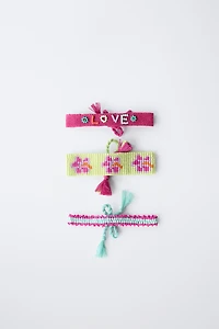 LOT DE TROIS BRACELETS DE FANTAISIE
