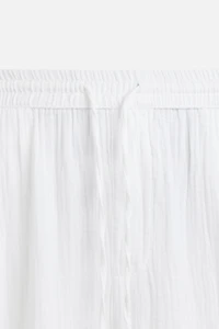 CRINKLED EFFECT PANTS