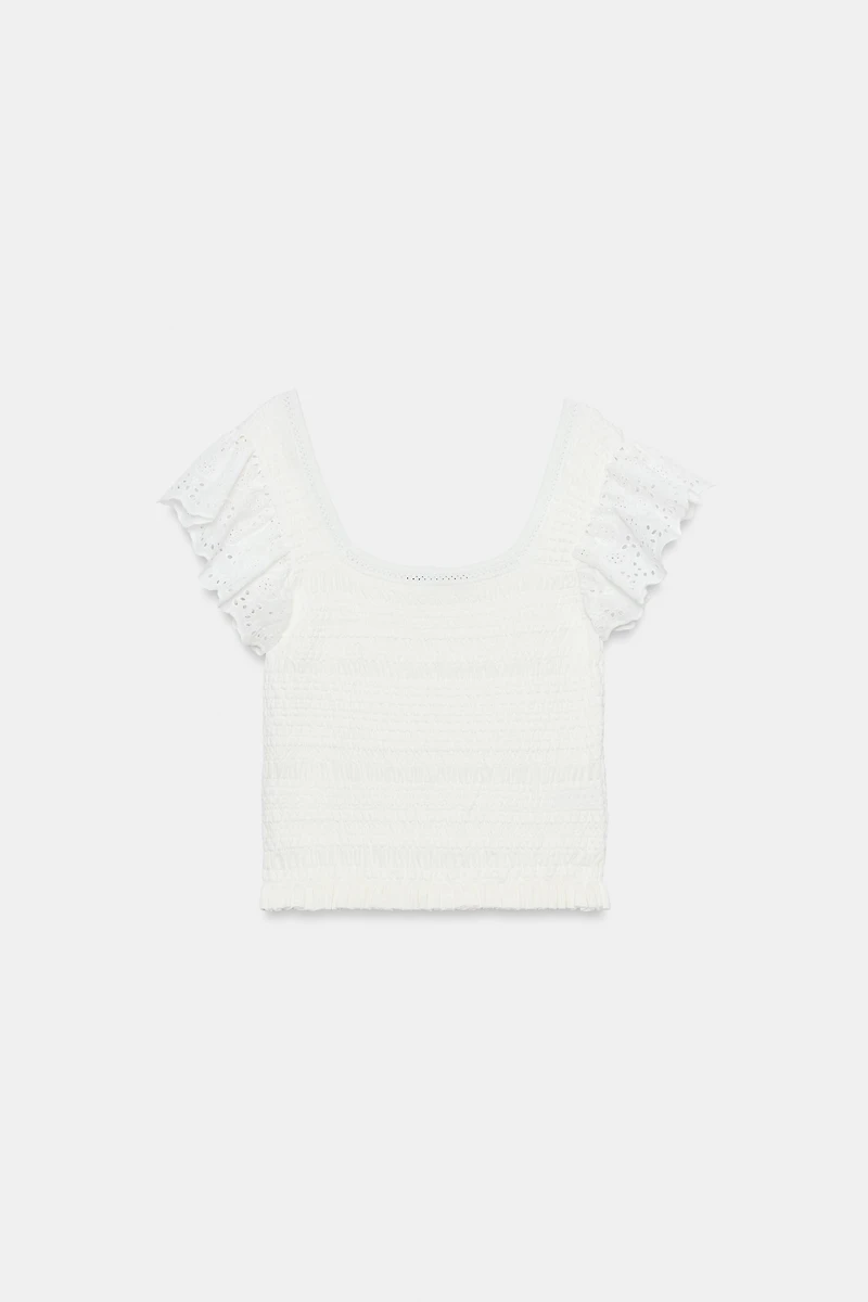 EMBROIDERED EYELET KNIT TOP
