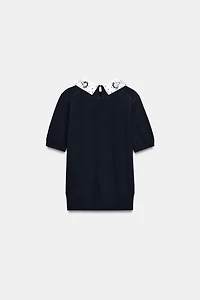 POLO EN MAILLE À FANTAISIE BIJOUX