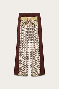 LIMITED EDITION MIXED PRINT FLOWY PANTS