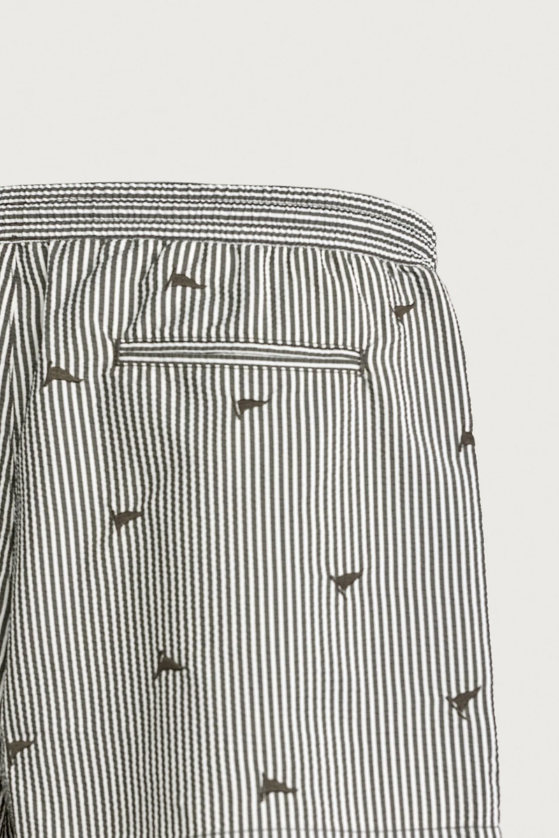 EMBROIDERED SEERSUCKER SWIM SHORTS