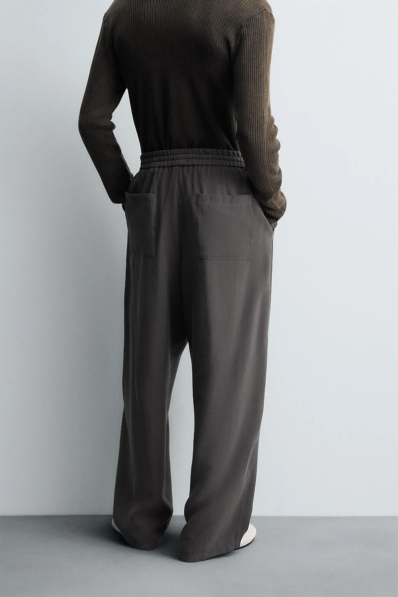 FLOWY TOPSTITCHED PANTS