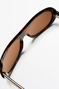 Oval tortoiseshell-effect sunglasses