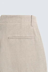 PANTALON À PLIS EN COTON ET LIN