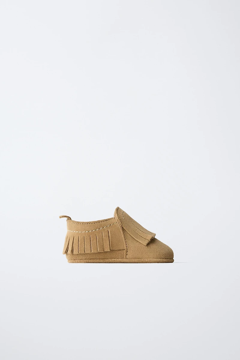CHAUSSURES EN CUIR