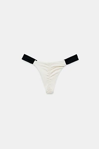 BAS DE BIKINI AVEC FRONCES ET CONTRASTE