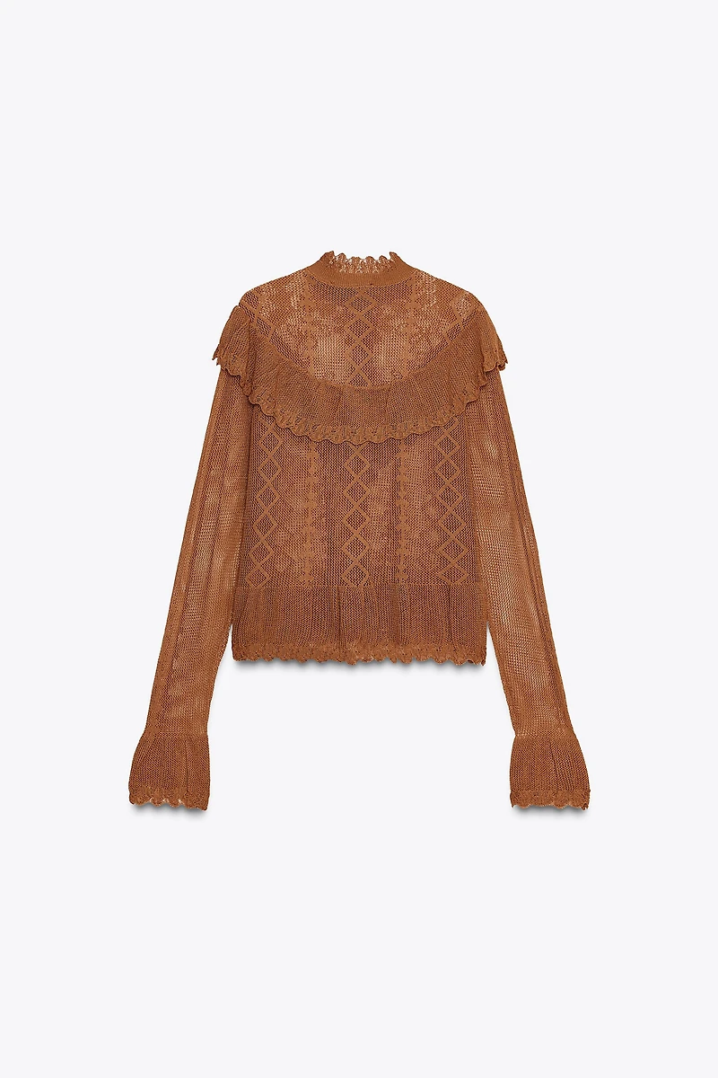 GILET ROMANTIQUE EN MAILLE POINTELLE
