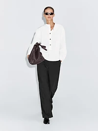 Stand collar shirt with gold buttons