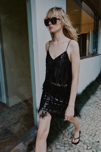 FRINGED SEQUIN TOP