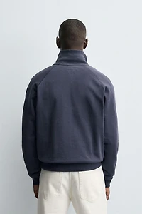 QUARTER-ZIP SWEATSHIRT