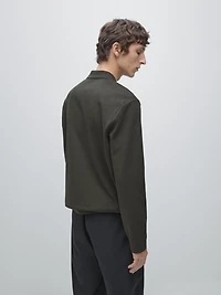 Long sleeve polo shirt with ribbed detail