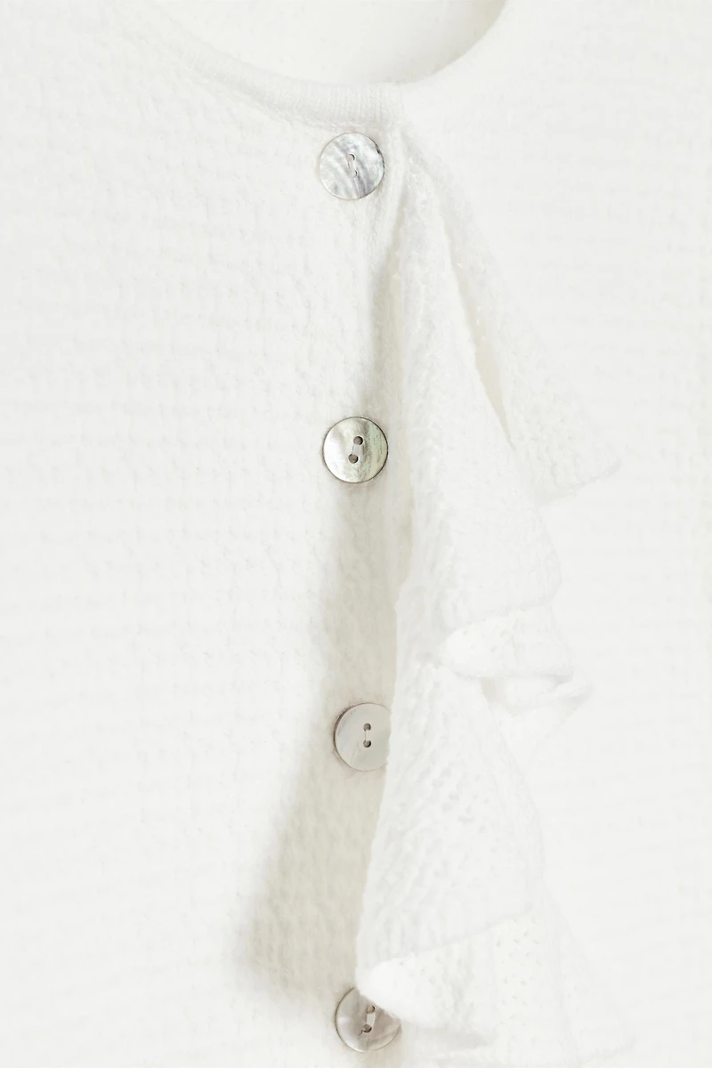 RUFFLED SHORT SLEEVE CARDIGAN