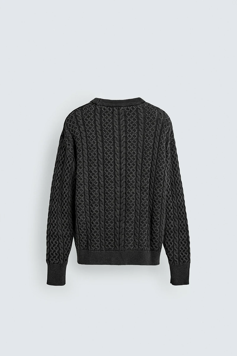 GARMENT-DYED CABLE KNIT SWEATER