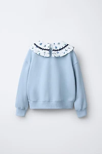SWEATSHIRT WITH RUFFLED NECK AND EMBROIDERED TEXT