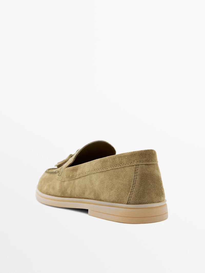 Split leather loafers with tassels