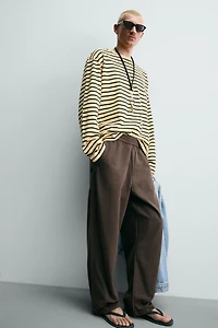 RELAXED FIT HERRINGBONE PANTS