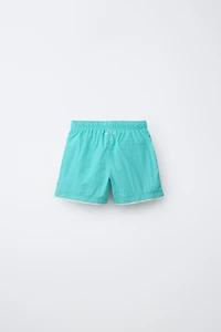 AGES 6-14 / SWIM SHORTS WITH DOUBLE CONTRAST HEM