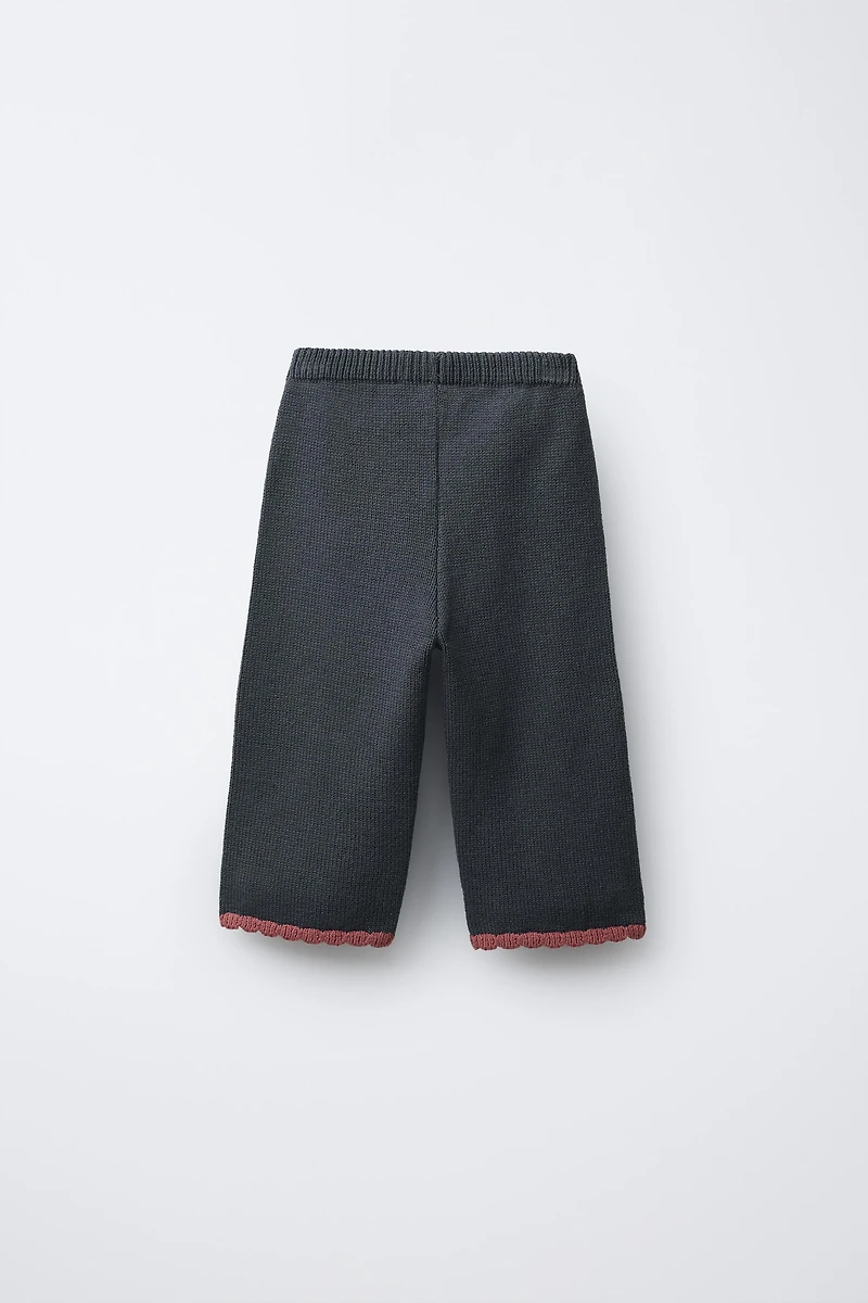 PANTALON JUPE-CULOTTE EN MAILLE FLEURS BRODÉES