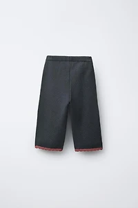 PANTALON JUPE-CULOTTE EN MAILLE FLEURS BRODÉES