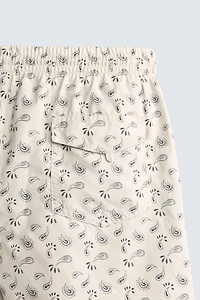PAISLEY PRINT MID-LENGTH SWIM SHORTS