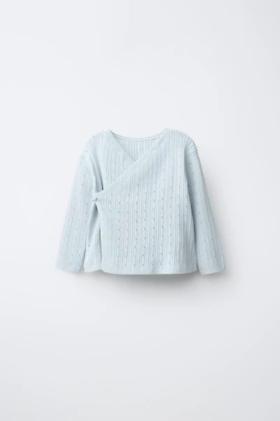 PULL EN MAILLE CÔTELÉ AJOURÉ