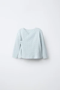 PULL EN MAILLE CÔTELÉ AJOURÉ