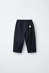 PANTALON STRUCTURÉ AVEC ÉTIQUETTE
