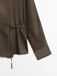 Flowing shirt with waist detail
