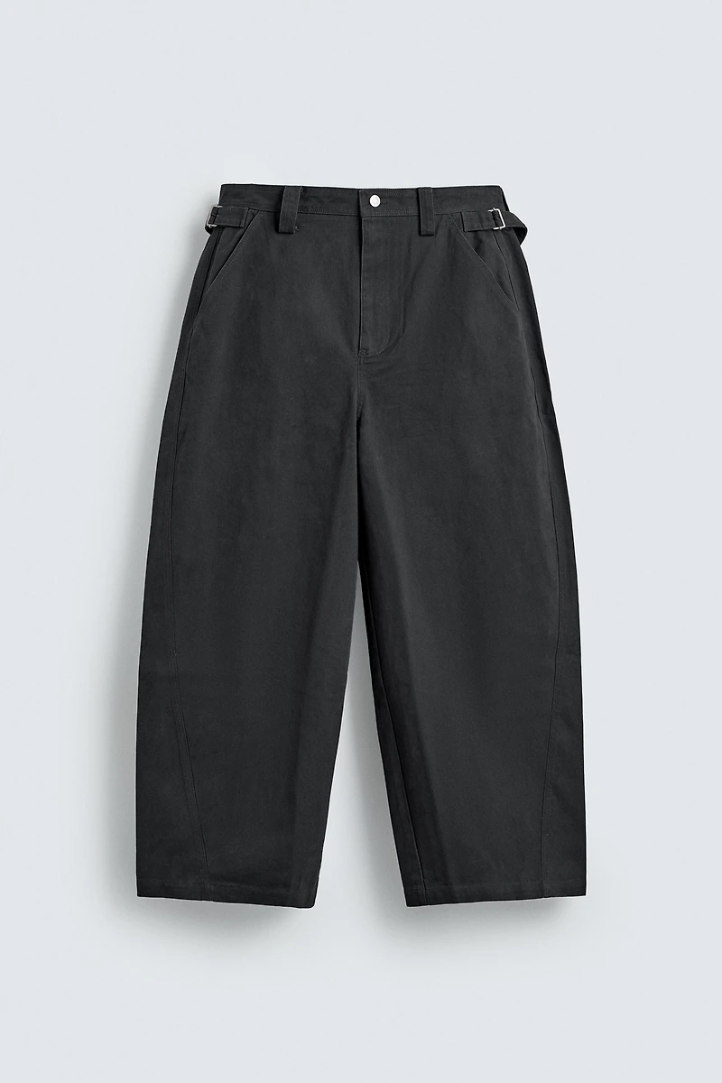 RELAXED FIT PANTS WITH TWISTED SEAM