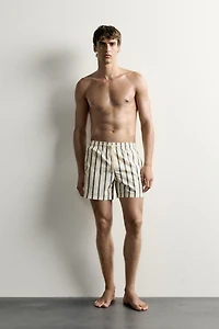 STRIPED MID-LENGTH SWIM SHORTS