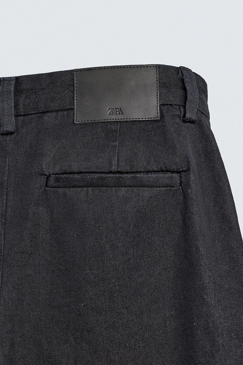 PLEATED DENIM CHINO PANTS