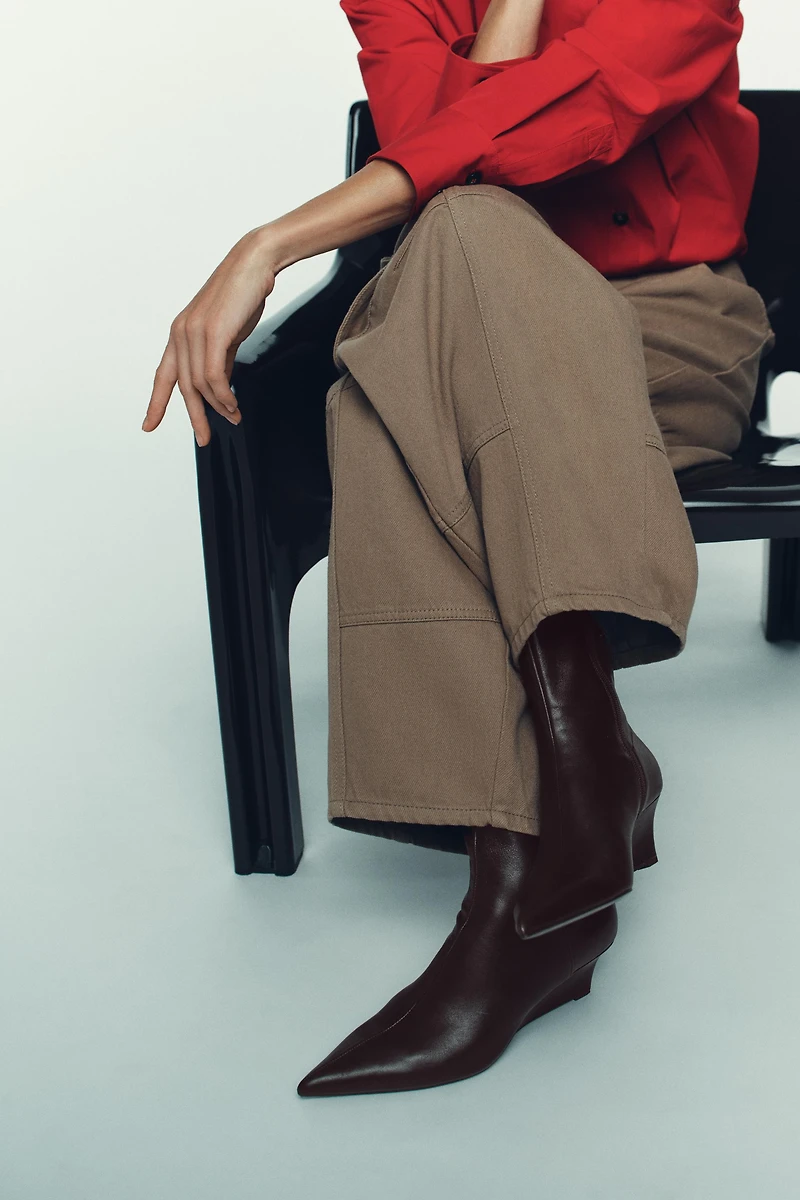 BOTTINES EN CUIR À TALONS COMPENSÉS