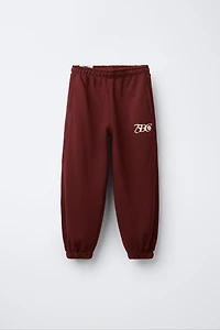 ENSEMBLE SWEAT ZIPPÉ ET PANTALON JOG TEXTE